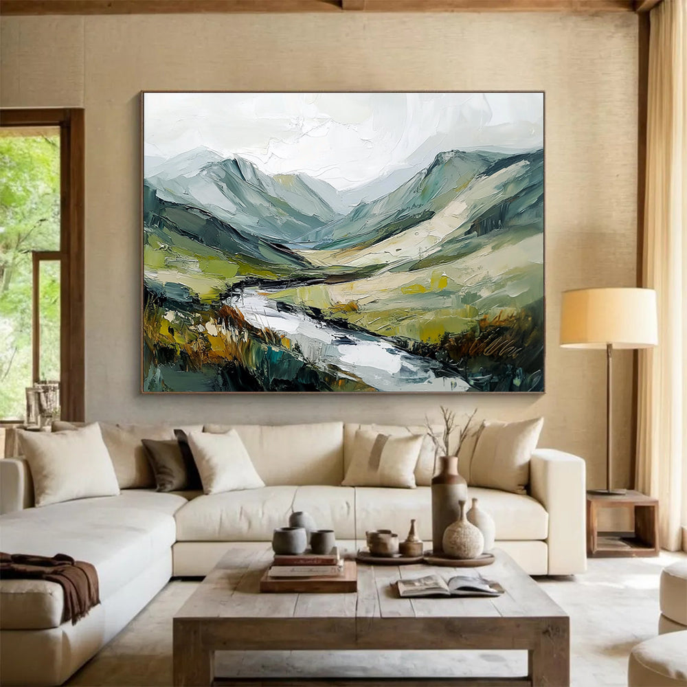 Large abstract painting of an Irish landscape with green and gray mountains flowing river and textured brush strokes against a white sky.SC596
