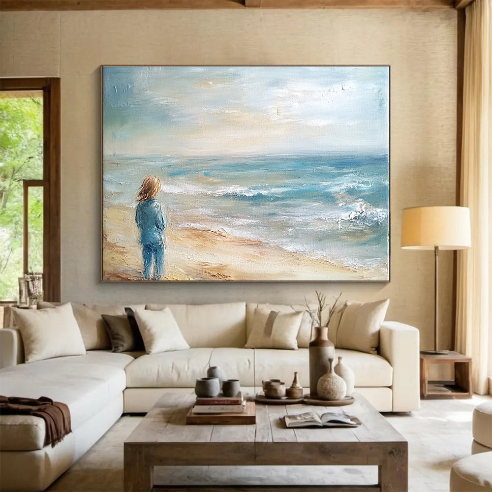 An abstract painting of the ocean and beach in light blue tones and muted colors creates a serene and beautiful atmosphere.SC411