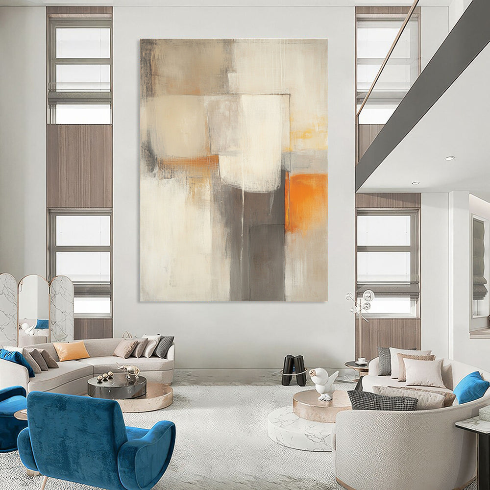 Large abstract painting in beige and grey tones featuring blurred geometric shapes and a subtle orange accent for vibrancy.STSC753