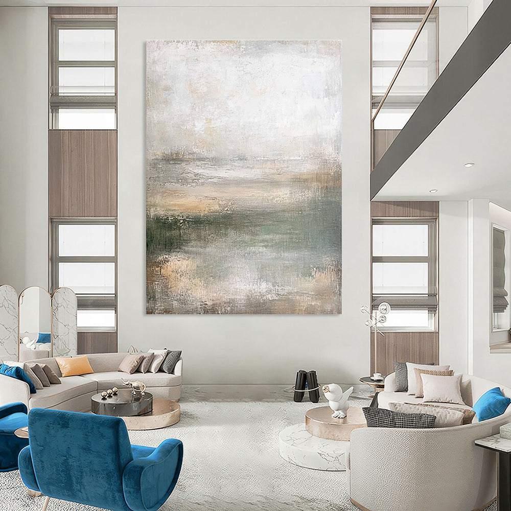 Large abstract painting in muted greens soft grays and beiges featuring a textured canvas and soft edges in neutral tones.STSC219