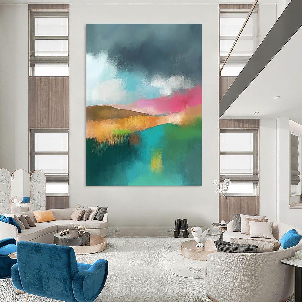Large abstract painting featuring light teal and pink hues with a green field brown hills and a dark grey sky adorned with white clouds.STSC087