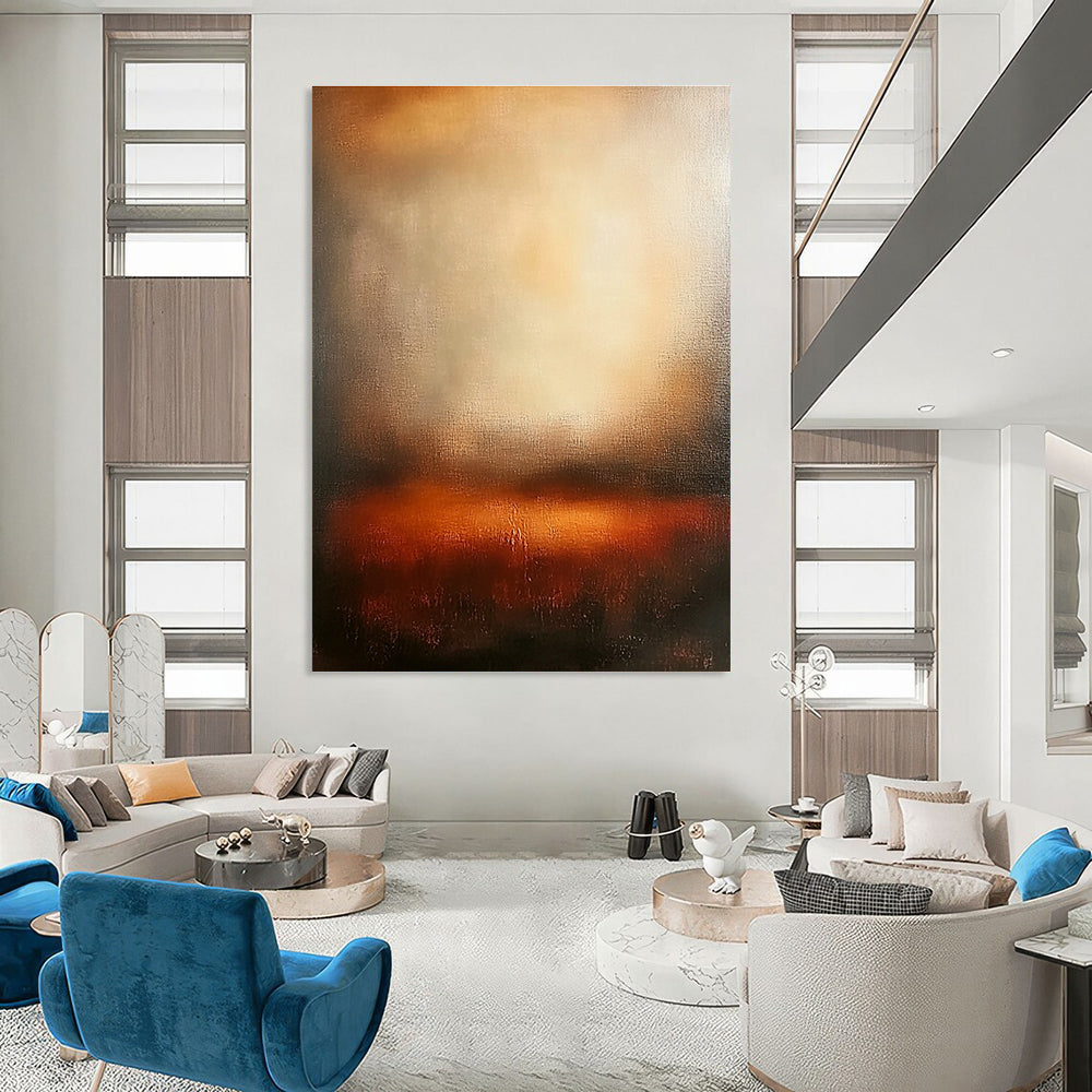 Large abstract painting featuring warm sunset colors with blurred edges and wide brush strokes evoking tranquility and emotional depth in a serene atmosphere.STSC111