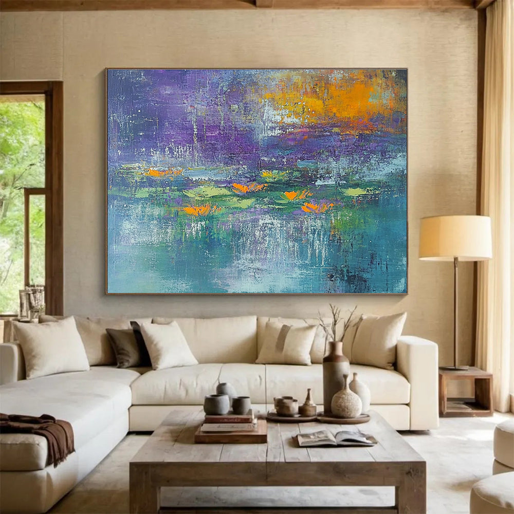 A large abstract painting featuring textured strokes in teal and purple with hints of orange and yellow, depicting serene water lilies at dawn.SC433