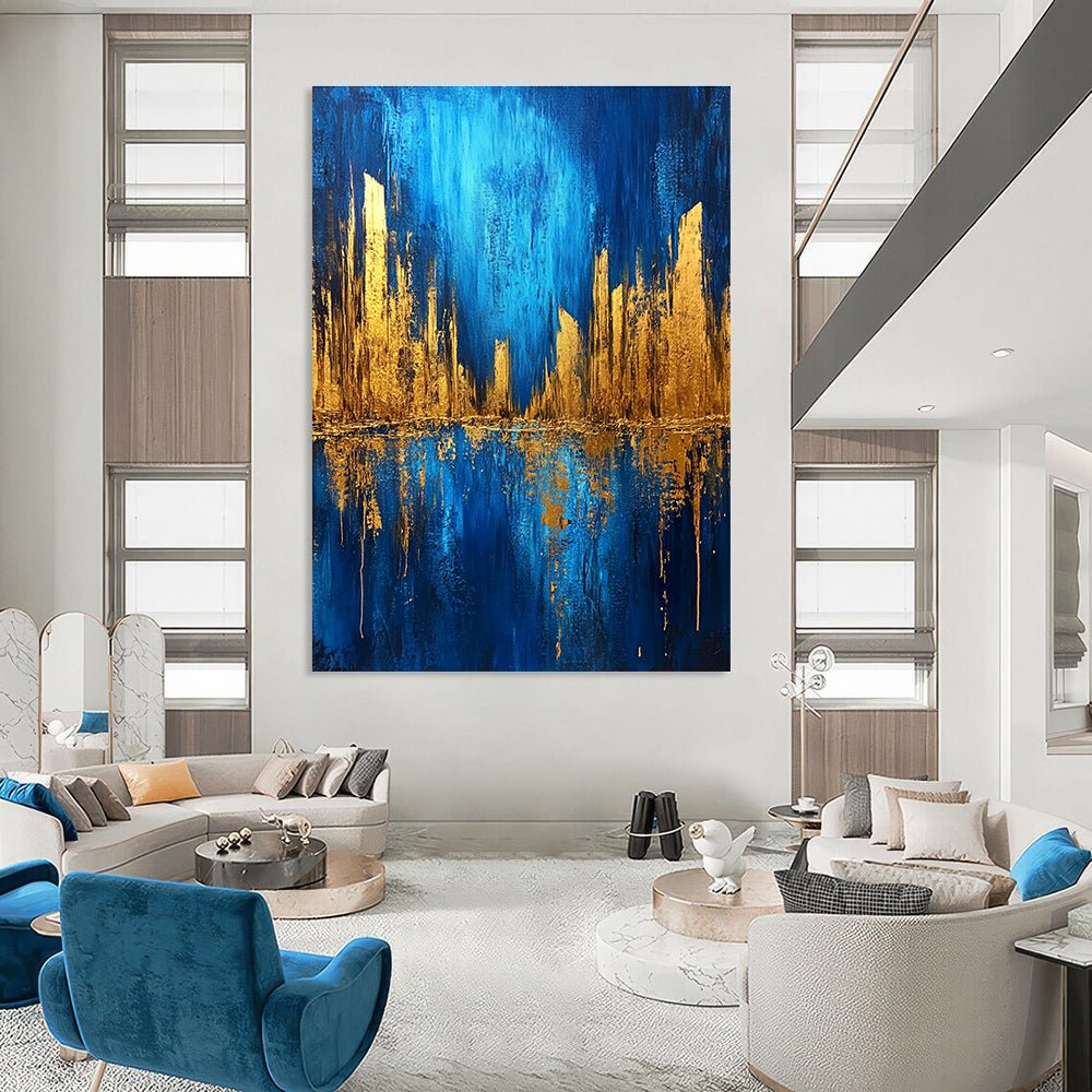 Large abstract painting featuring a metallic gold and blue cityscape on a dark textured background with bold brush strokes.STSC578