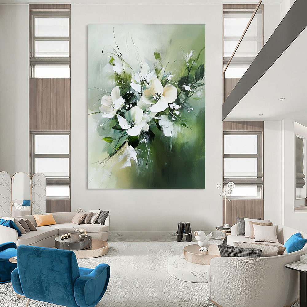 Large abstract painting featuring white flowers and green leaves in neutral tones against a soft green blurry background.STSC365