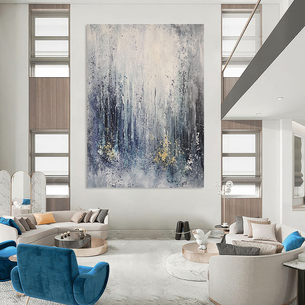 Large abstract painting capturing an ice storm featuring frozen waterfalls and icicles in gray tones with splashes of gold and blue.STSC607