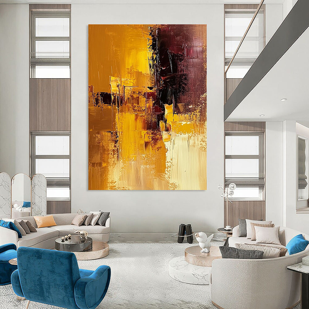 Large abstract painting in warm brown and yellow tones showcasing a textured surface for a striking artistic statement.STSC603