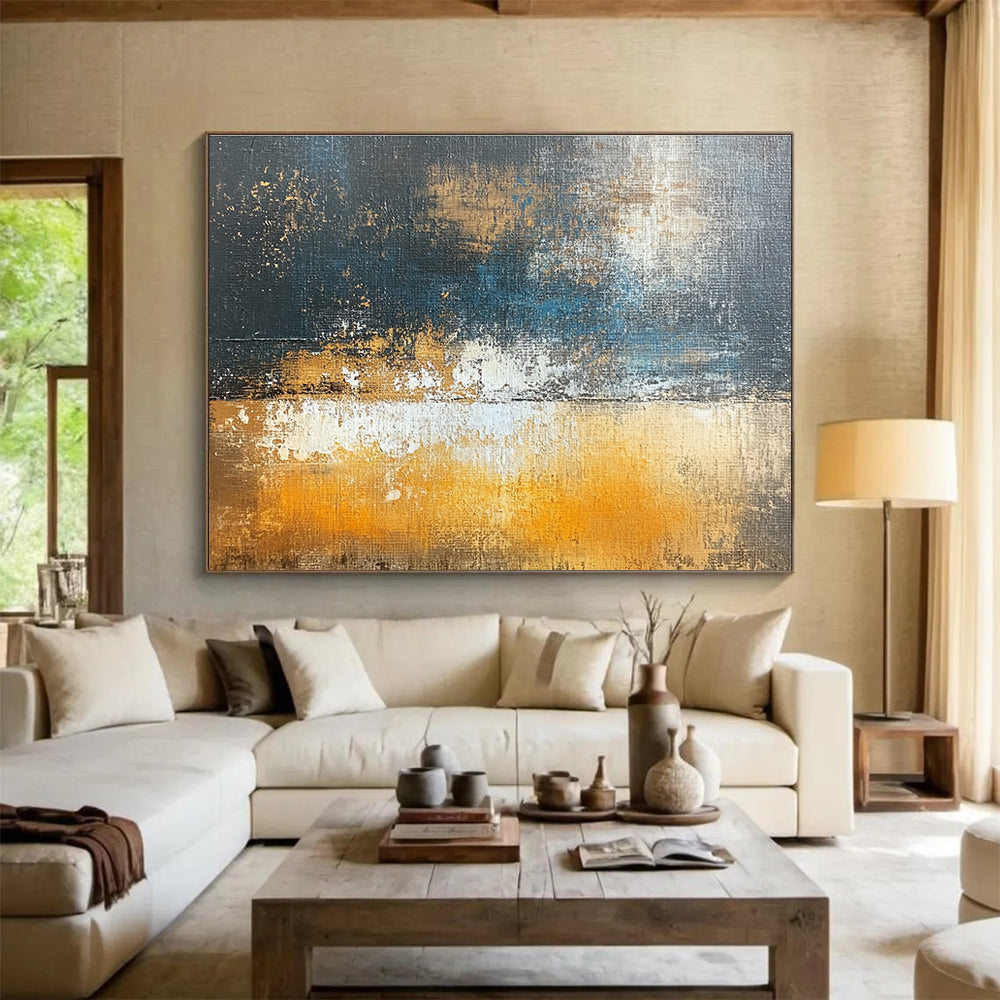 Large abstract oil painting depicting an urban landscape in dark gray and light amber with brown and blue accents using large brush strokes.SC109