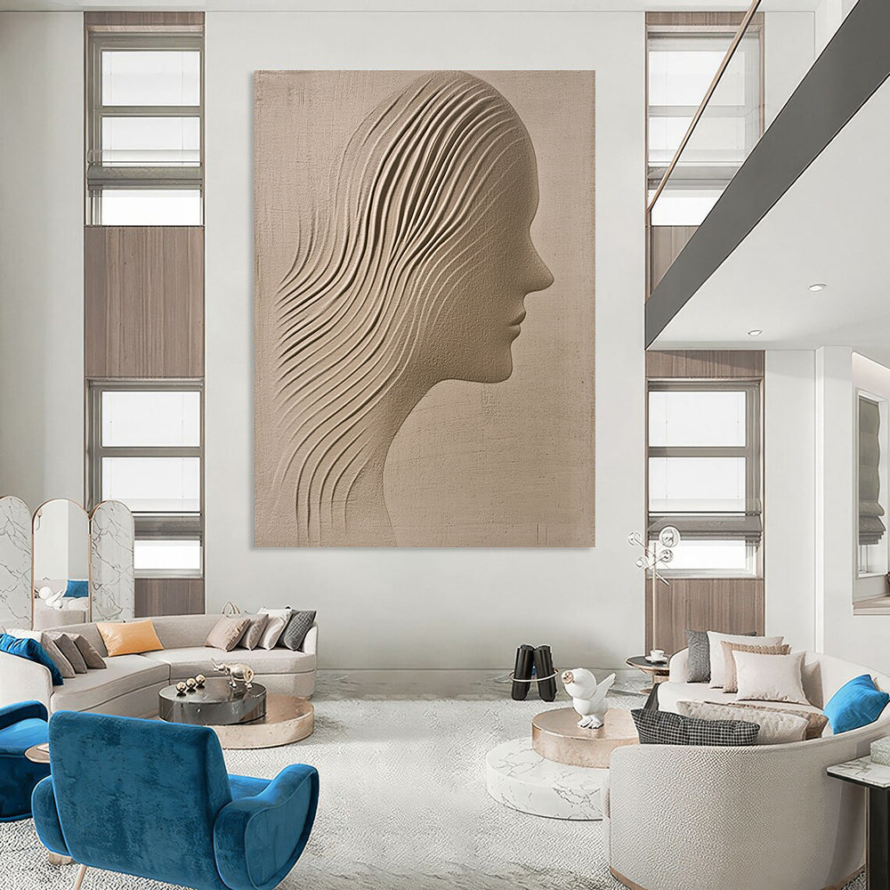 A large abstract painting featuring a sand-colored textured wall with an ethereal woman's silhouette gracefully carved into it.STSC1213