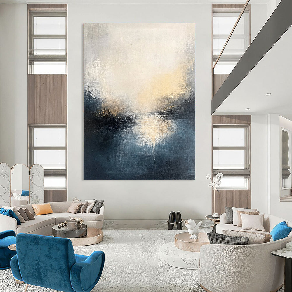 Large abstract oil painting featuring a misty gray and dark blue seascape with light yellow sun rays illuminating the horizon.STSC169