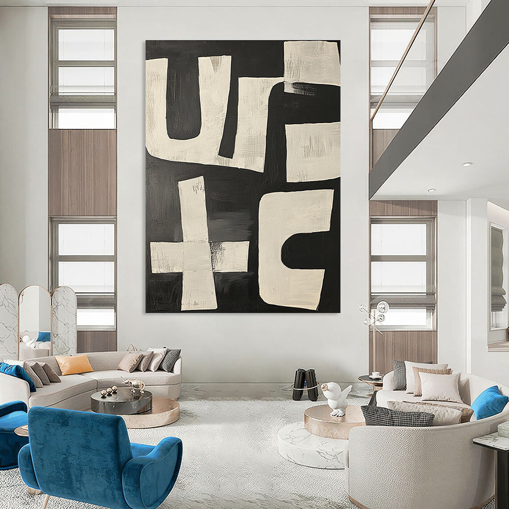 Large abstract painting featuring dynamic black and white shapes resembling the word use in a bold and energetic composition.STSC1133
