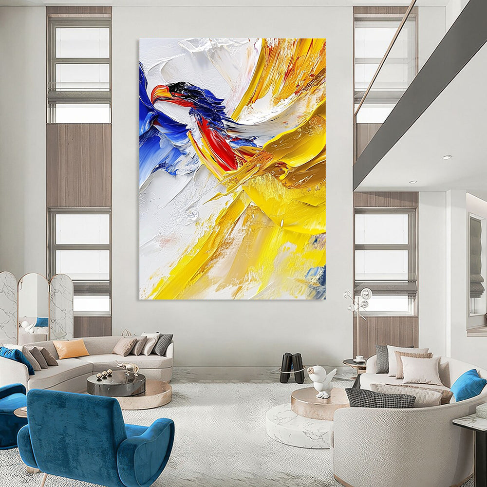 Large abstract painting with impasto technique showcasing vibrant yellow and blue hues featuring a detailed vulture against a white cloud background.STSC426