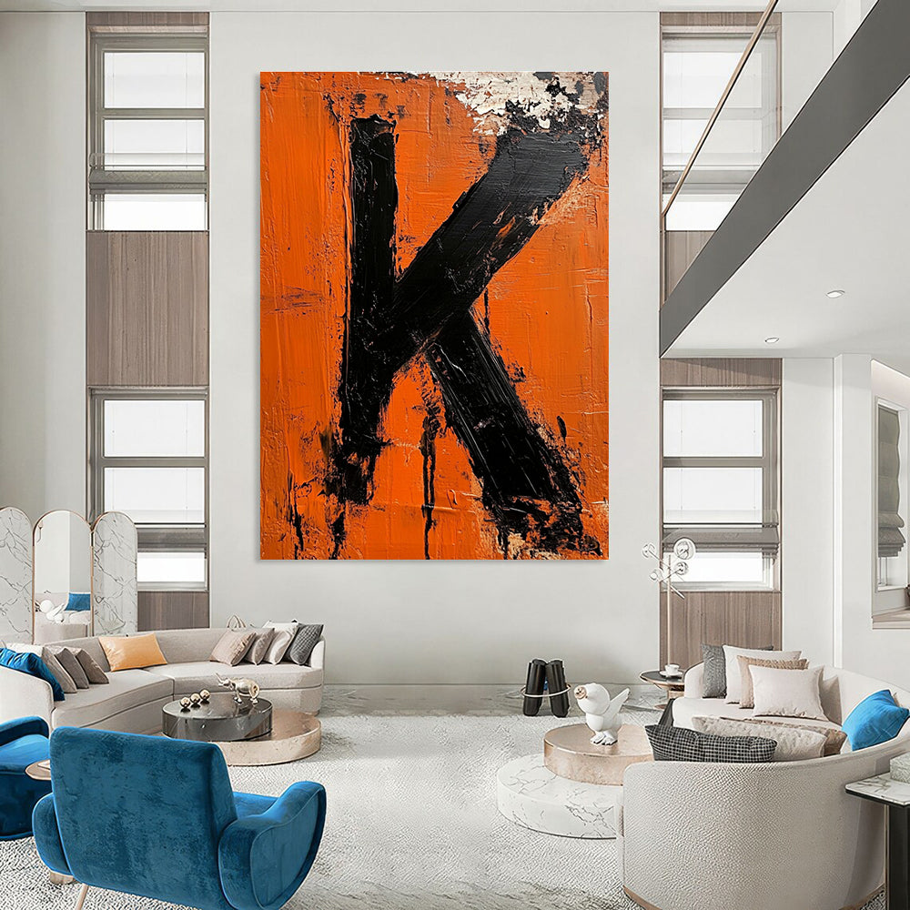 Large abstract impasto oil painting featuring the letter K in vibrant orange and black inspired by minimalist design.STSC1326