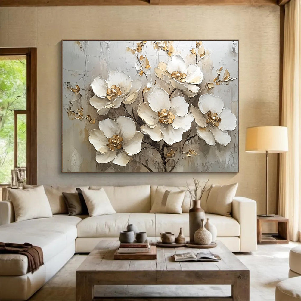A large abstract painting featuring white flowers with gold accents on a white background, showcasing elegant details and soft lighting in a neutral palette.SC623