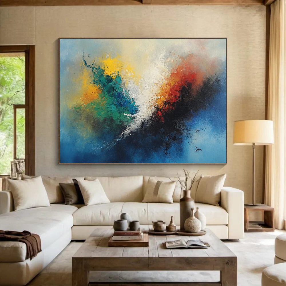 A large abstract painting featuring vibrant colors with a central fire-like figure and serene sky blue background.SC323