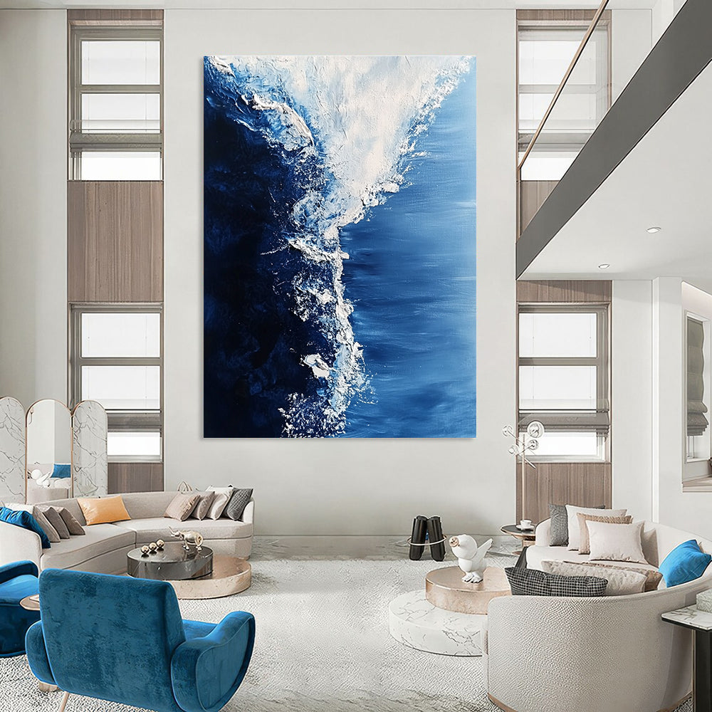 Large abstract painting of swirling Arctic sea in white and blue tones features visible brush strokes and snow crystal details for a hyper-realistic effect.STSC348