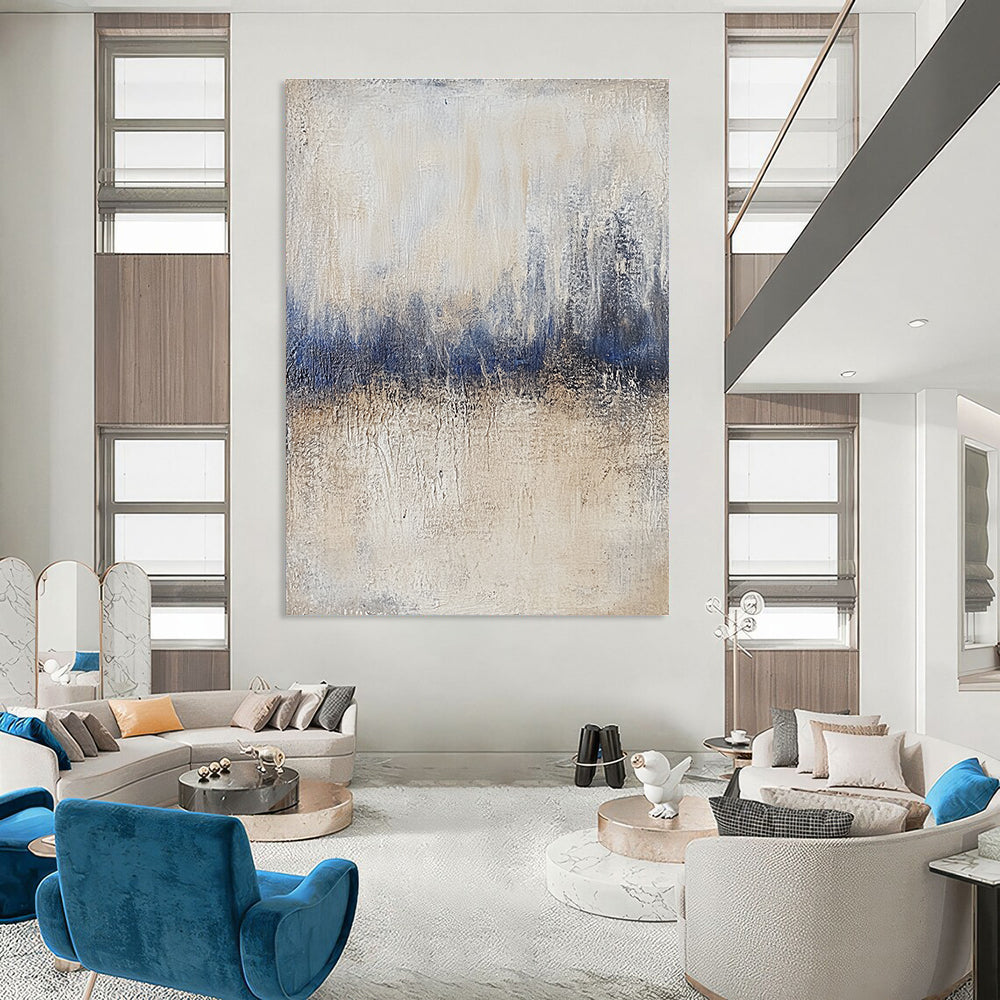 Large abstract painting featuring textured beige and blue tones with vintage aesthetics and impasto technique on a layered gray background.STSC732
