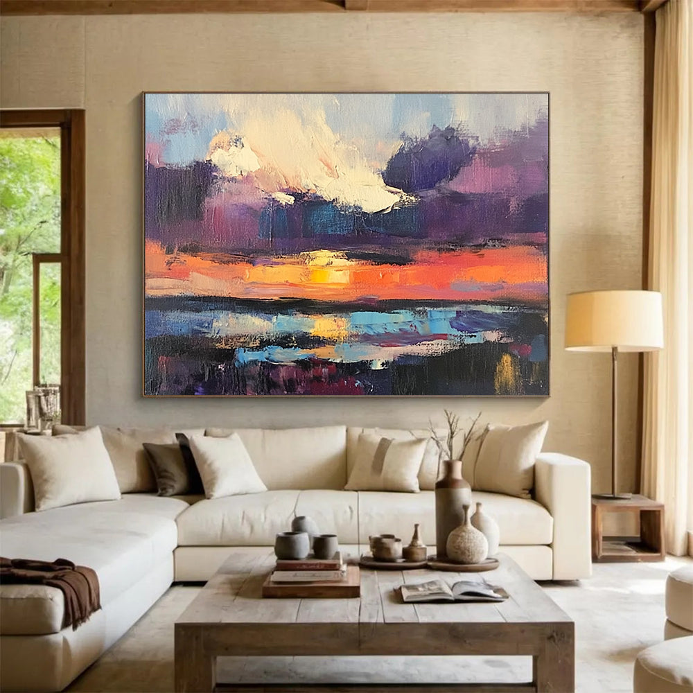 Large abstract painting featuring a sunset over water with bold brush strokes in vibrant purple and blue hues capturing a dramatic sky filled with clouds.SC134