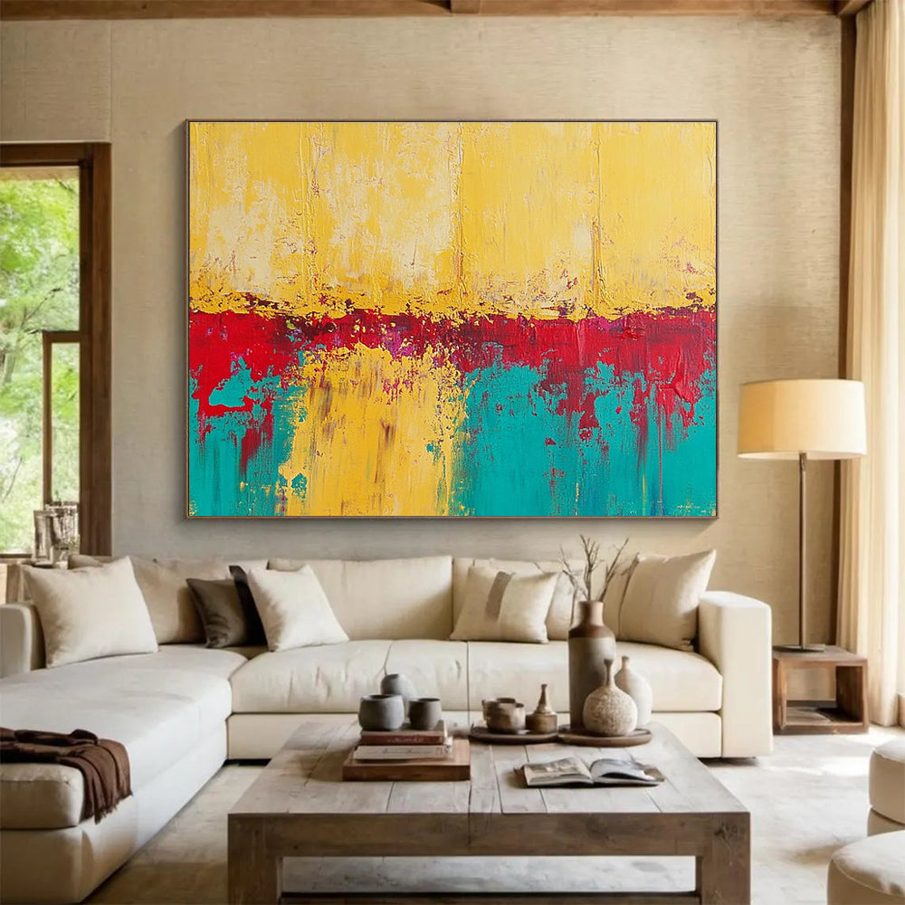 Large abstract painting featuring textured yellow sand with teal and red accents creating a vivid and captivating visual experience.SC269