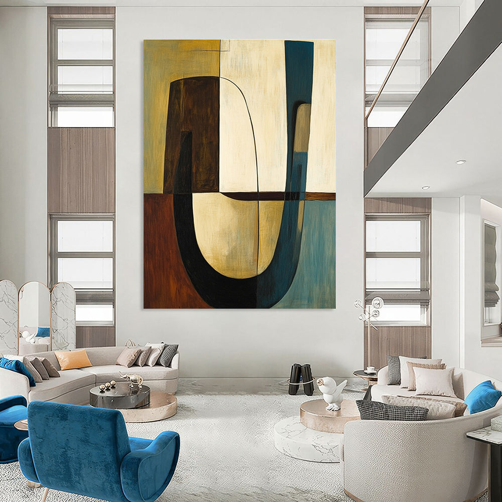 Abstract painting featuring shapes and lines in olive green with brown accents complemented by a large curved table and two chairs.STSC693