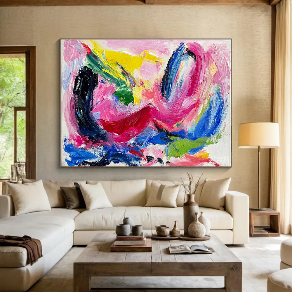 Large abstract painting featuring vibrant pink and blue hues thick brush strokes and dynamic black swirls with red lines and green shapes on a white backgroundSC150