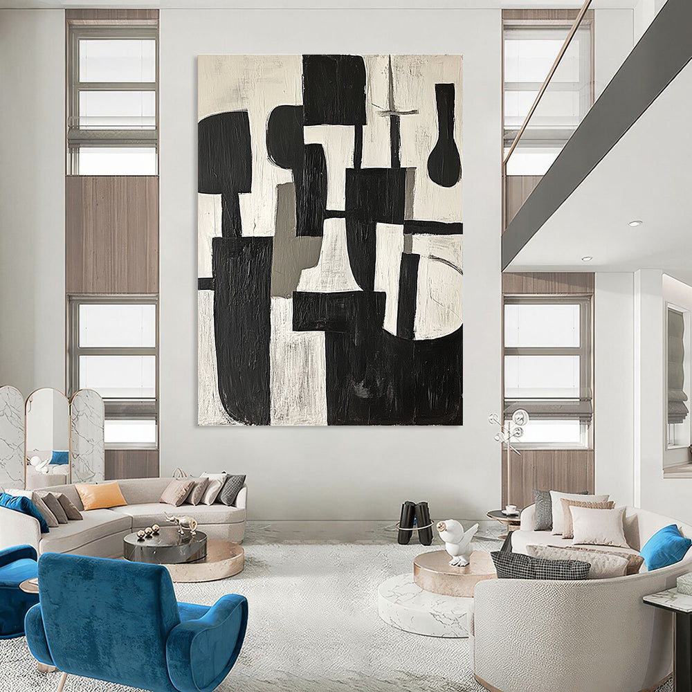 Large abstract painting in black and white shapes with gray tones on a white background embodying calmness and modernity inspired by Picasso's cubism.STSC675