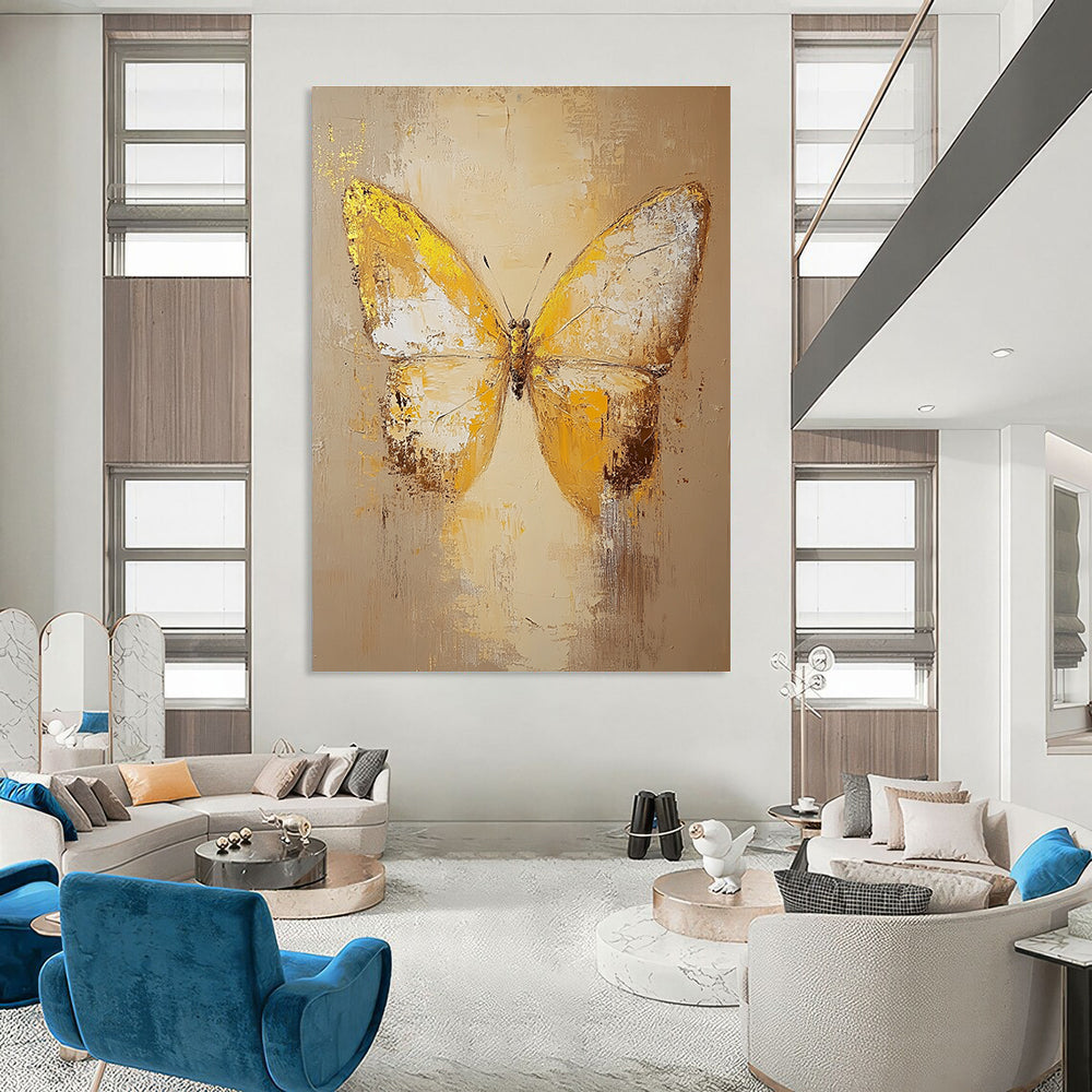 Large abstract butterfly painting in beige and yellow tones with textured old canvas and gold elements, capturing a love for nature and artistic expression.STSC1028
