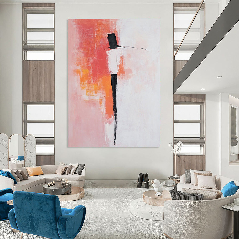 Large abstract painting with pink and white background featuring bold brush strokes simple shapes and peachy red accents with black dress shoes.STSC404