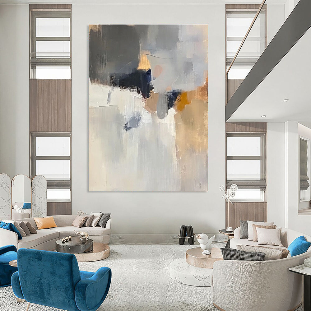 Large abstract painting with soft light colors grey and white atmospheric shapes hints of brown blue and yellow in muted tones.STSC686