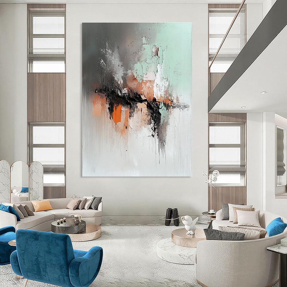 Large abstract painting featuring soft gray mint green and rust orange with a dark brown lava flow and a blurred silhouette walking away.STSC795