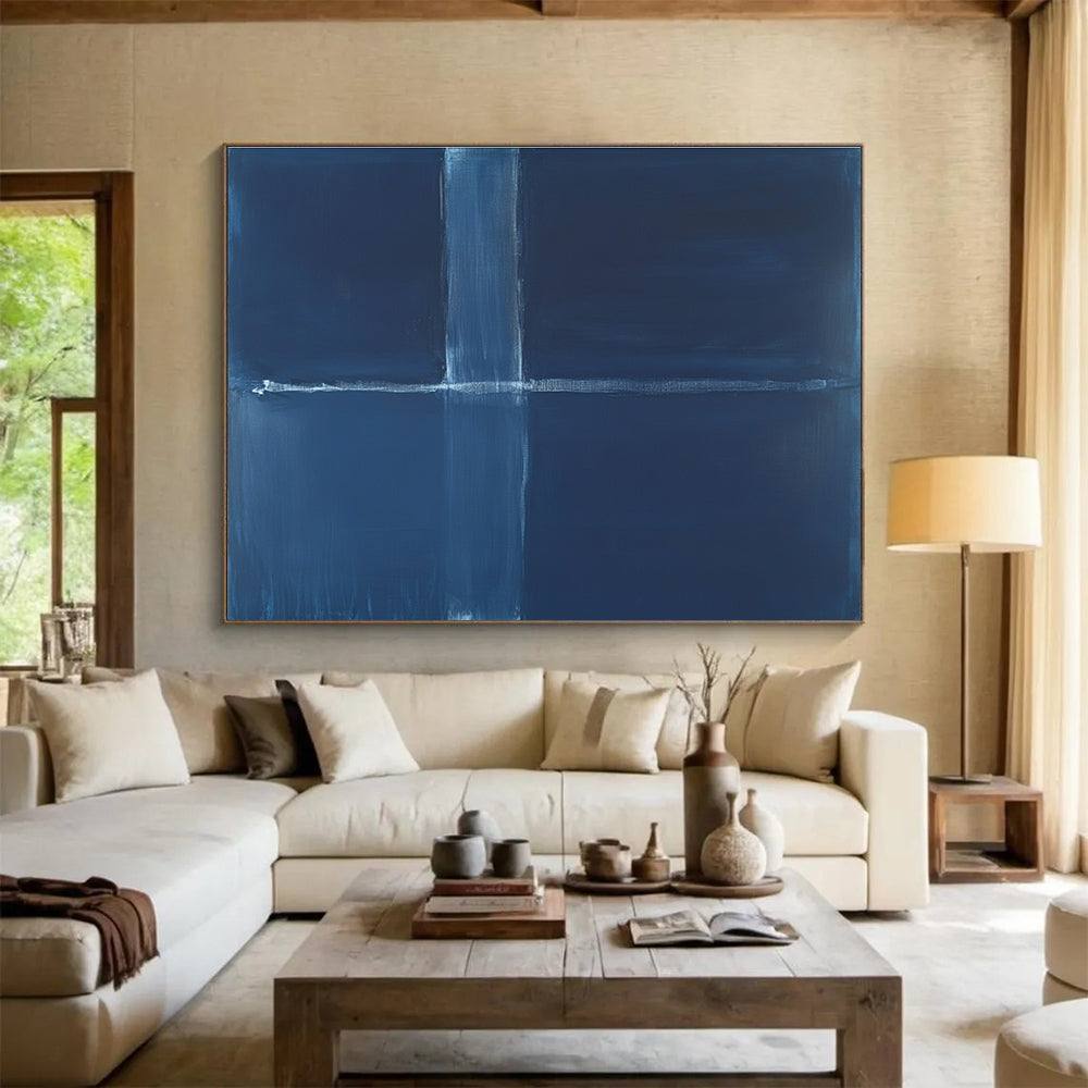 A large abstract painting featuring a deep blue background with a thin straight line and a thick wavy line in the center.SC515