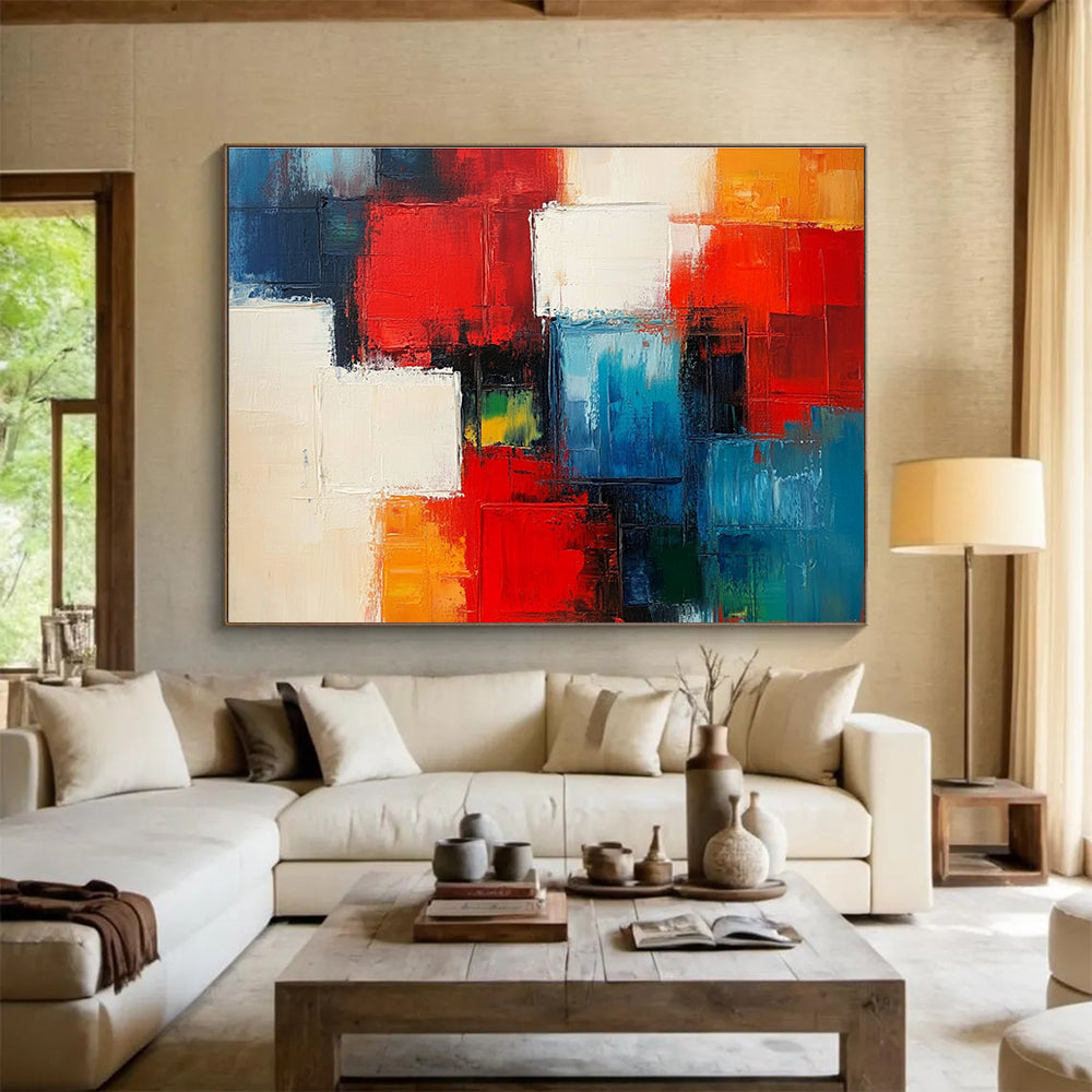A large abstract painting of city blocks in red and blue with white squares and thick brush strokes.SC347