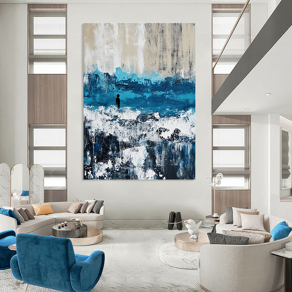 Large abstract painting of an ocean with waves in blue and gray featuring white caps for a serene coastal ambiance.STSC266