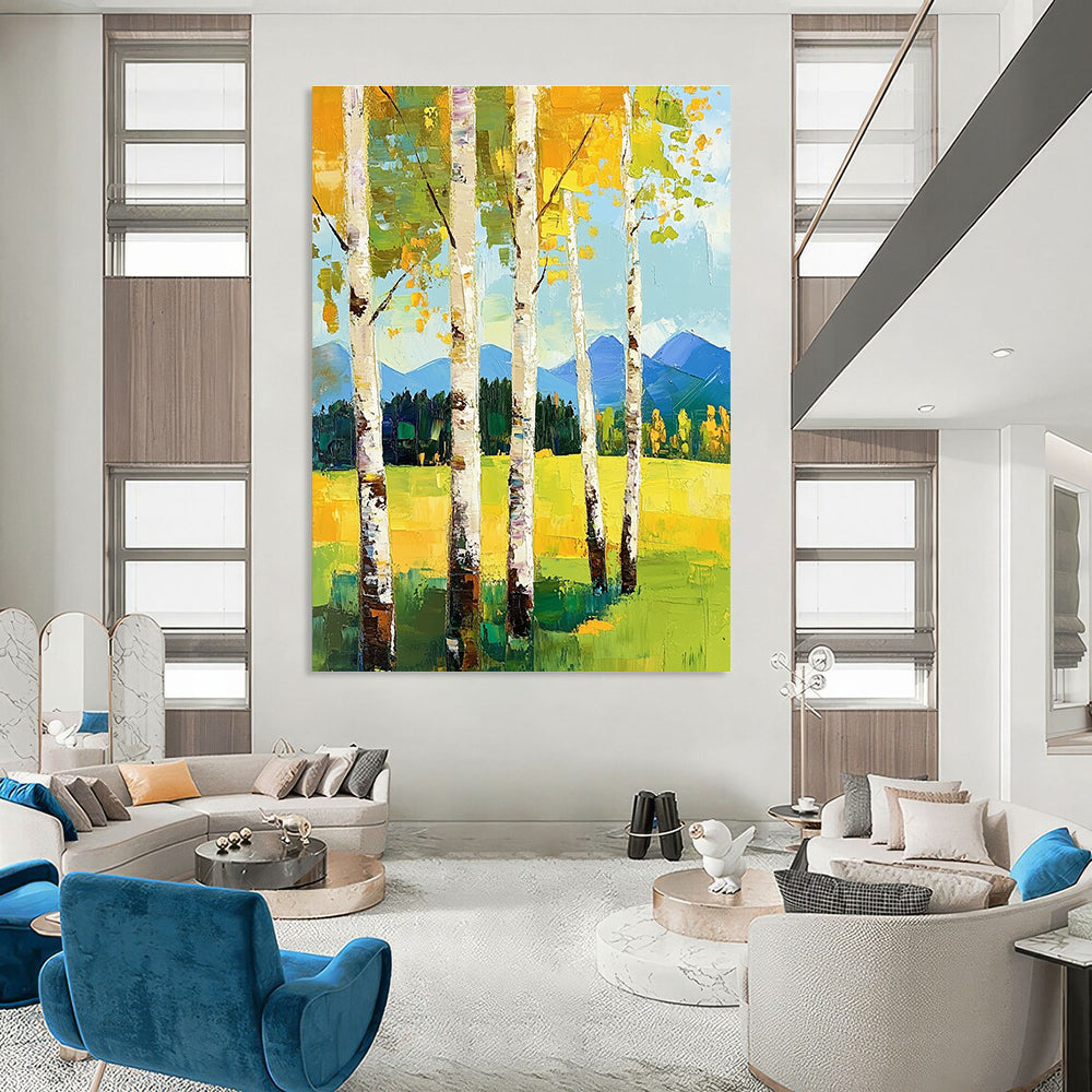 Large abstract painting featuring birch trees in spring vibrant greens and yellows with mountains in the background and thick expressive brush strokes.STSC871