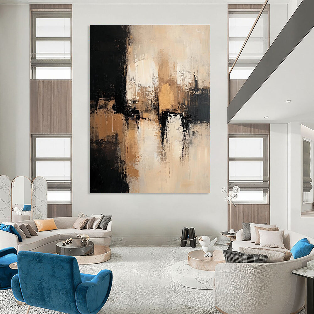 Large abstract painting featuring neutral tones with black beige and white depicting an urban landscape with dark brown and gold accents.STSC775