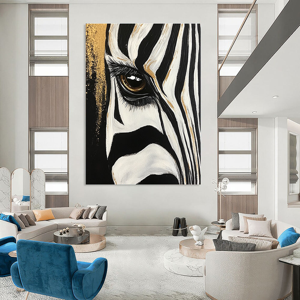 Large abstract painting of a zebra's eye and stripes featuring bold brushstrokes with gold accents against a textured black and white background.STSC956