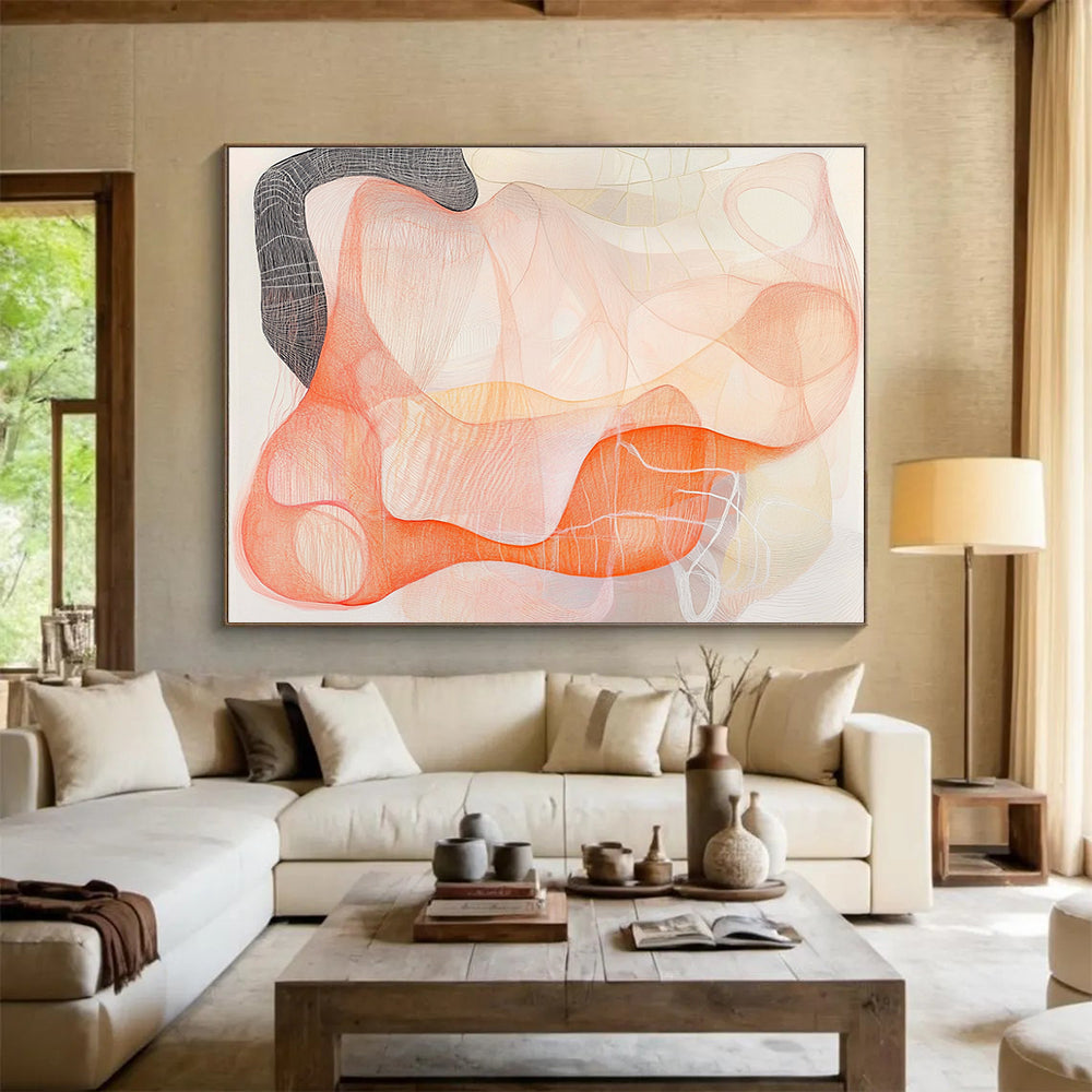 Large abstract artwork featuring delicate orange and pink threads with a black ink outline suggesting women's forms against a white background, evoking calm and elegance.SC304