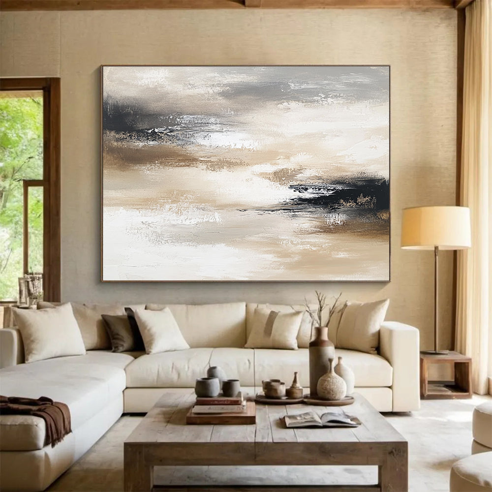 Large abstract painting in neutral tones evokes calmness with layers of soft grays browns beige whites and black creating movement and depth.SC246