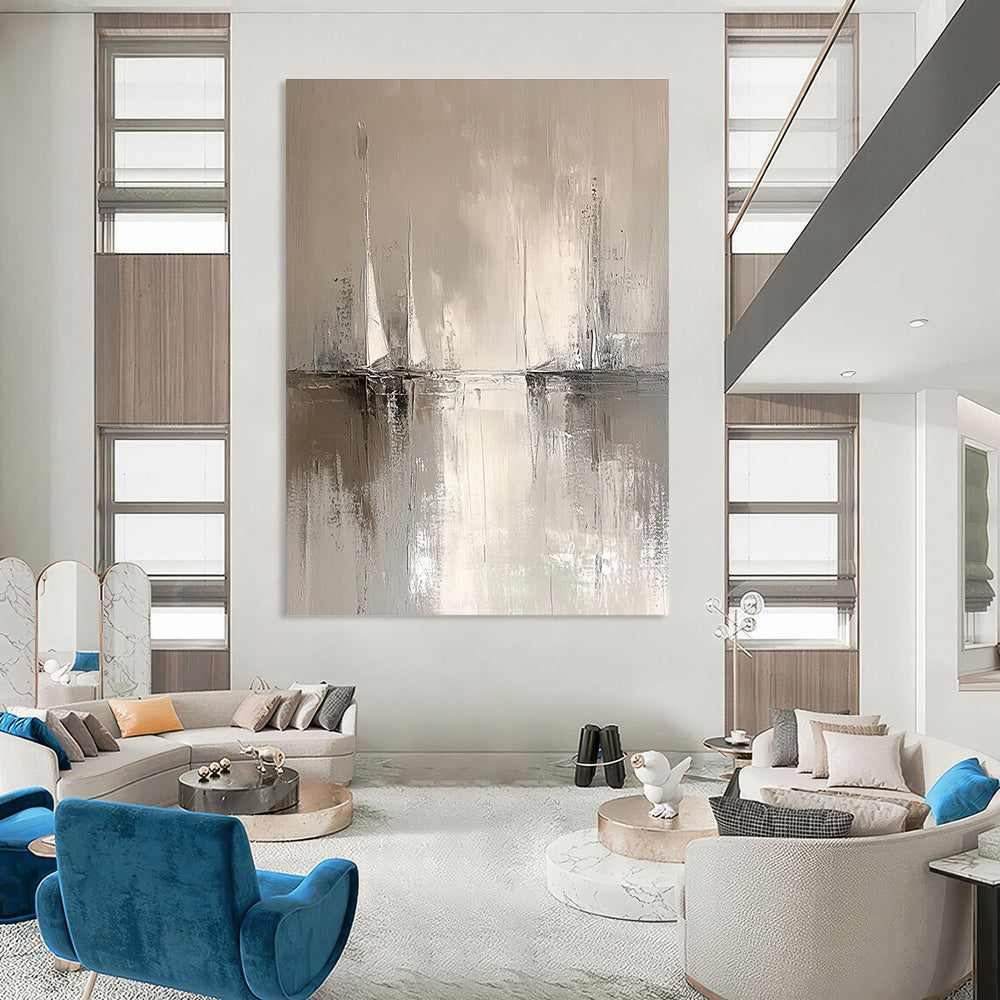 Large abstract painting in minimalist style features sailboats on the horizon with soft water reflections in neutral tones of white and grey.STSC231