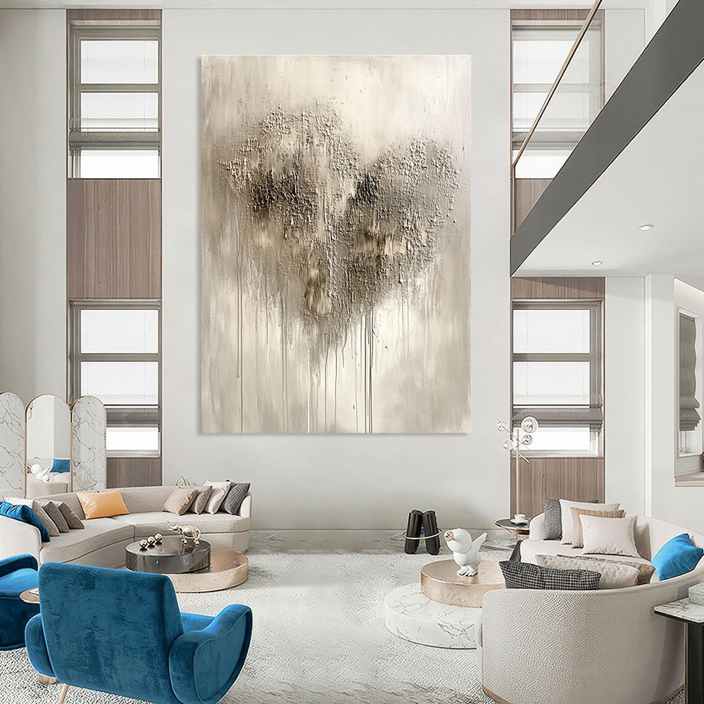 Large abstract painting in silvery gray with impasto texture featuring a heart-shaped pattern and accents of black and dark brown.STSC519