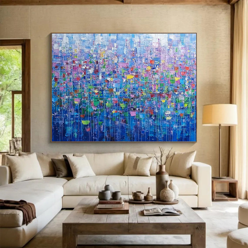 Large abstract painting of an urban landscape created with colorful squares and lines resembling small flowers in vibrant shades.SC474