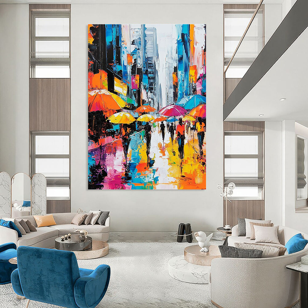 A large abstract painting depicting vibrant city streets with people under colorful umbrellas and towering skyscrapers highlighting urban energy and movement.STSC872
