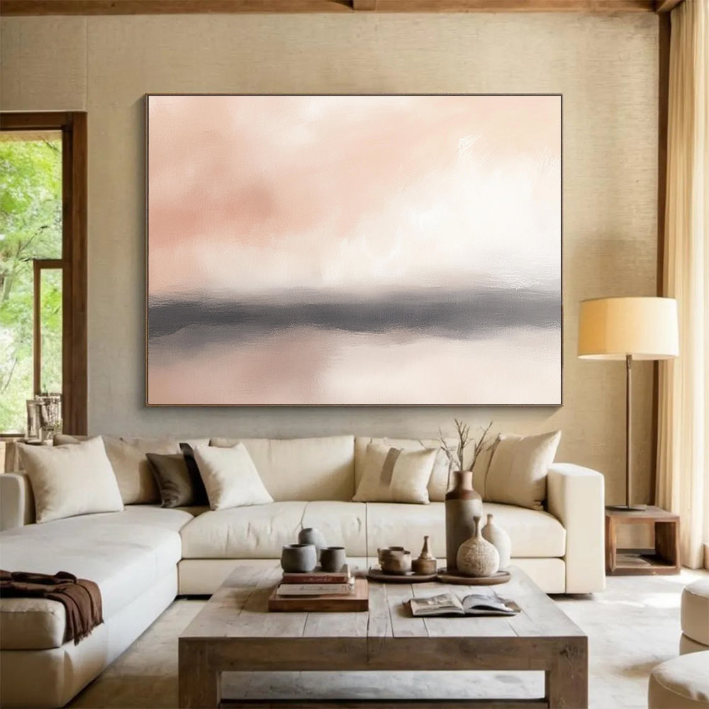 Large abstract painting of the horizon featuring soft pinks whites and hints of gray with blurry clouds for a serene atmosphere.SC360