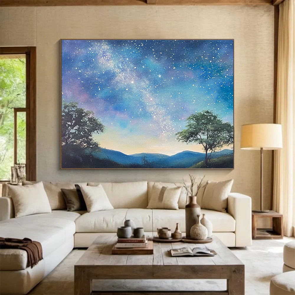 A large abstract painting featuring a serene starry sky with the Milky Way, silhouetted trees on hills, and a fantasy-inspired azure background.SC421