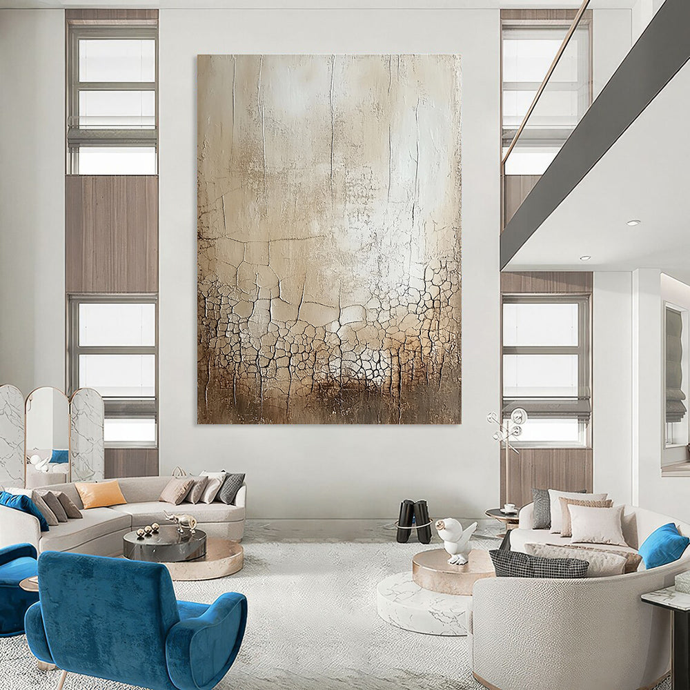 Large abstract painting featuring a blank canvas with a delicate white glaze showcasing random cracks and swirls in beige and gray shades.STSC292