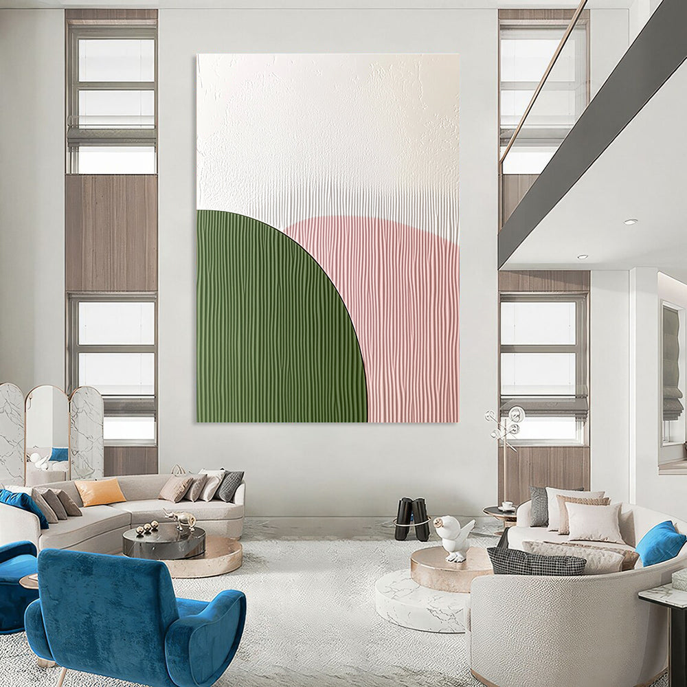 Abstract art featuring an arch-shaped wall decoration with a smooth white top and green textured paper bottom in soft pink pastel colors.STSC935