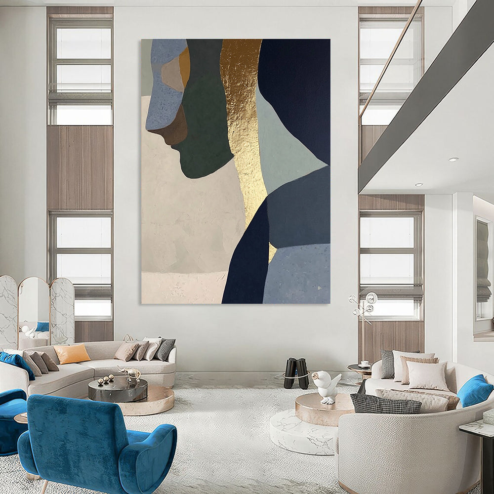 Abstract painting with gold foil depicting a woman in profile, blended neutral tones of sage green, blue, gray, beige, and navy blue.STSC756