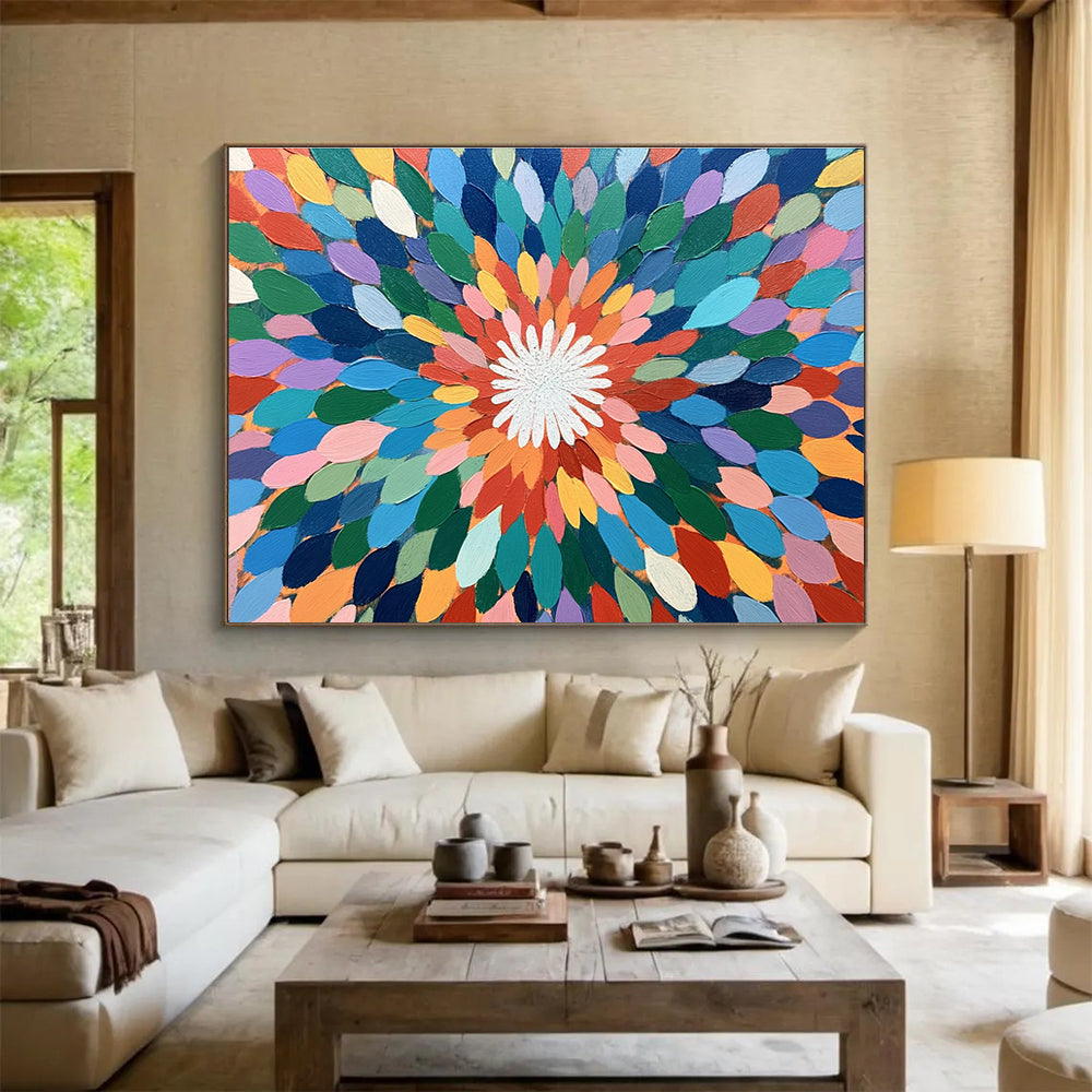 A large abstract painting featuring colorful overlapping petals in shades of green, blue, pink, orange, yellow, and purple with a vibrant center.SC526