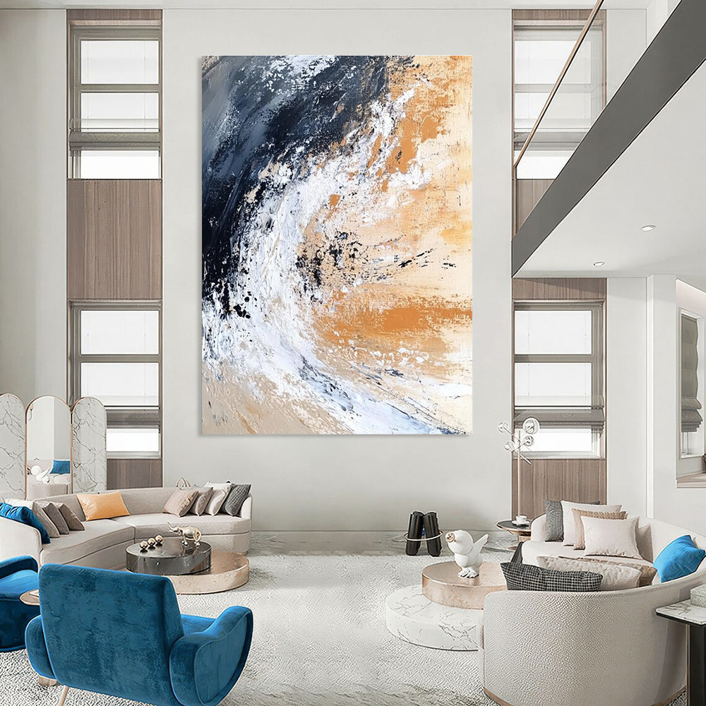 Large abstract painting depicting an ocean wave crashing on the shore in dark black and white with beige brown gray and rust orange.STSC555