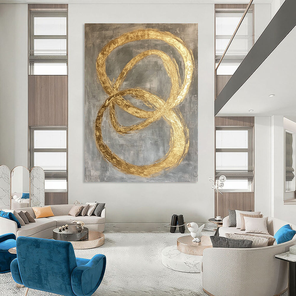 Large abstract painting featuring intertwined O-shapes in gold leaf on a modern grey background.STSC1295